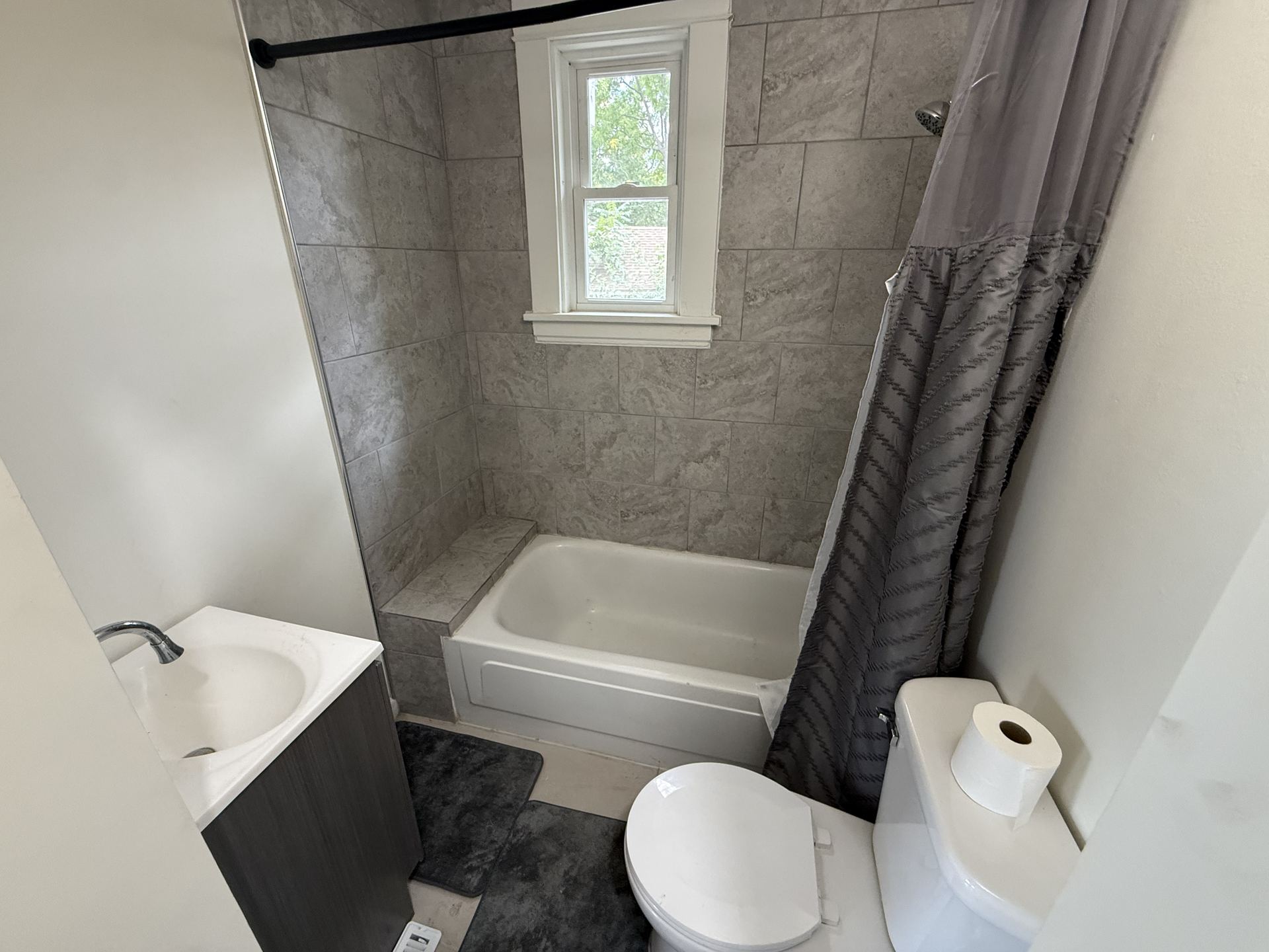 Bathroom with tub and shower