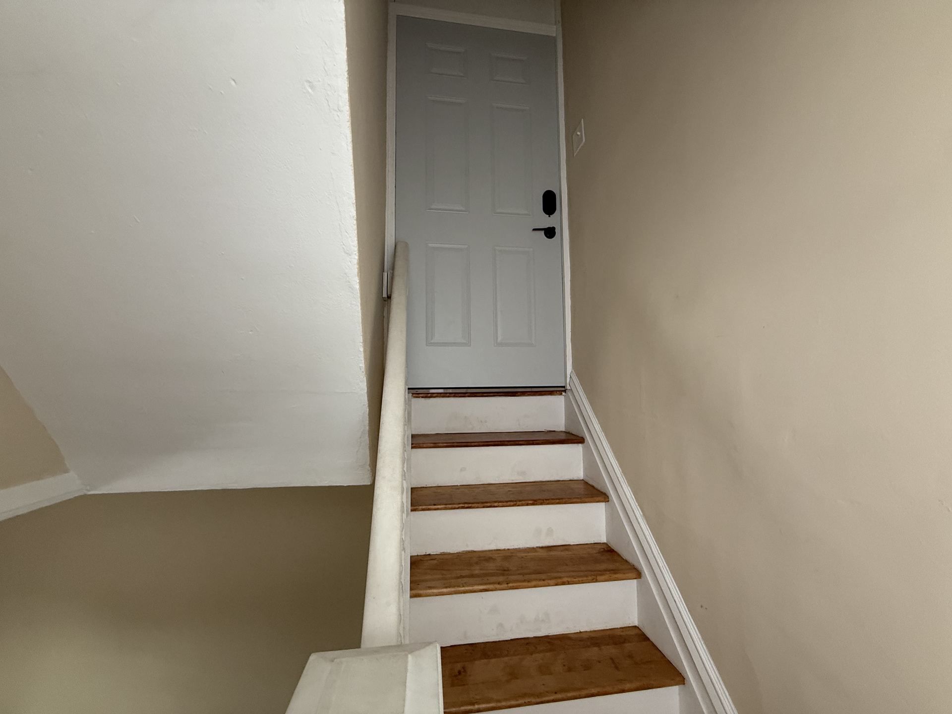 Stairwell leading to exterior door