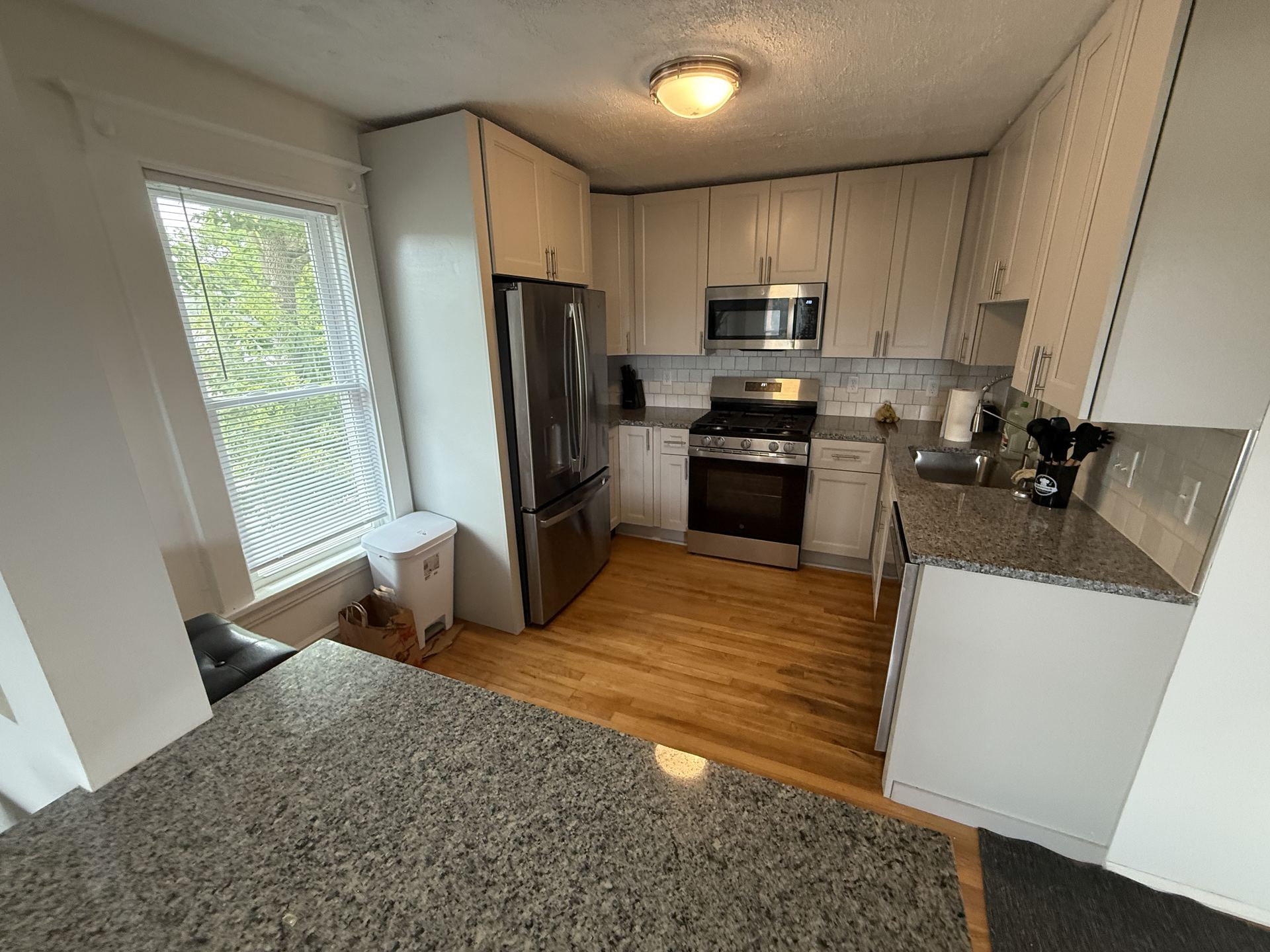 Kitchen with white cabinetry